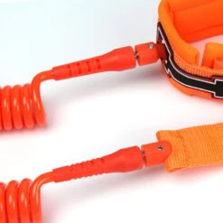 LEASH DE SUP HOWZIT COIL ORANGE -Magasin De Bateaux leash de sup howzit coil orange 3