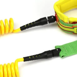 LEASH DE SUP HOWZIT COIL RASTA 9' -Magasin De Bateaux leash de sup howzit coil rasta 9 1 5